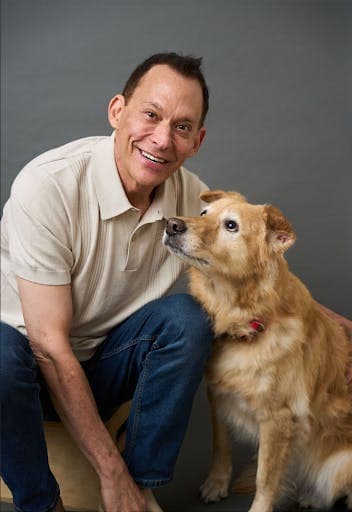 Dr. Jeff Kleinberg, author and therapist with his dog